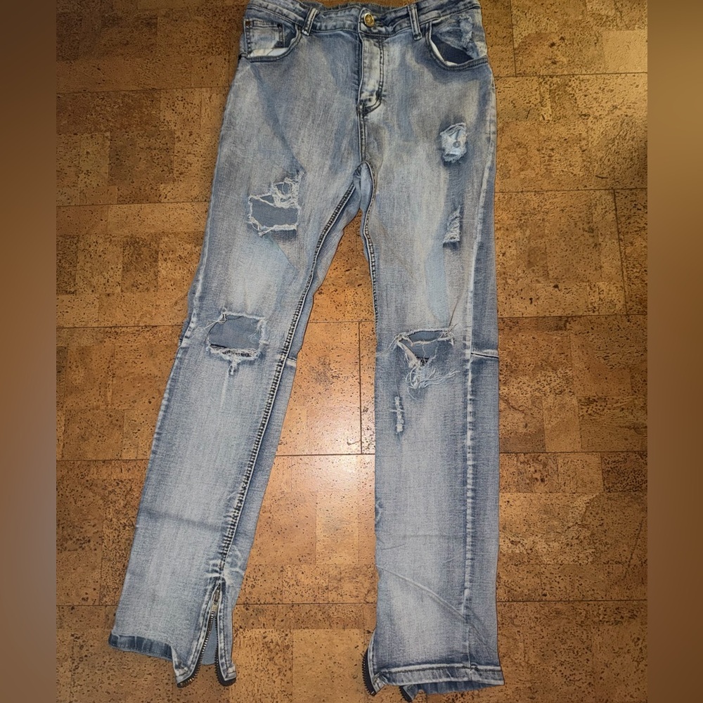 Distressed Light Blue Jeans
